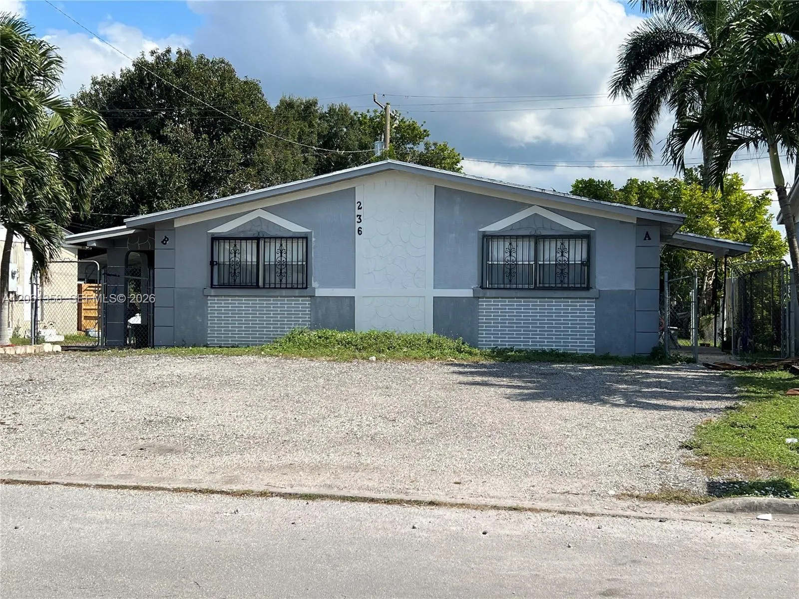 Foto de propiedad en 236 NW 9th Avenue, South Bay, FL 33493 South Bay con MLS# 