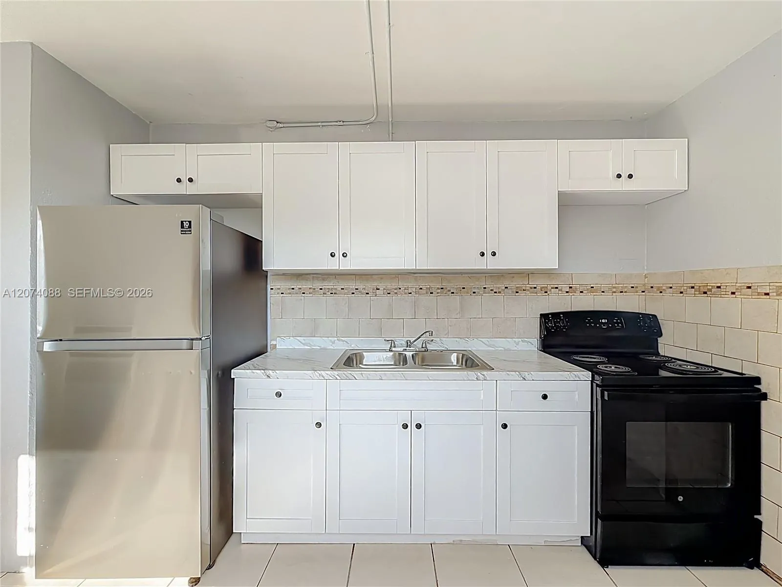 Foto de propiedad en 2408 NW 8th Street, Pompano Beach, FL 33069 Pompano Beach con MLS# 
