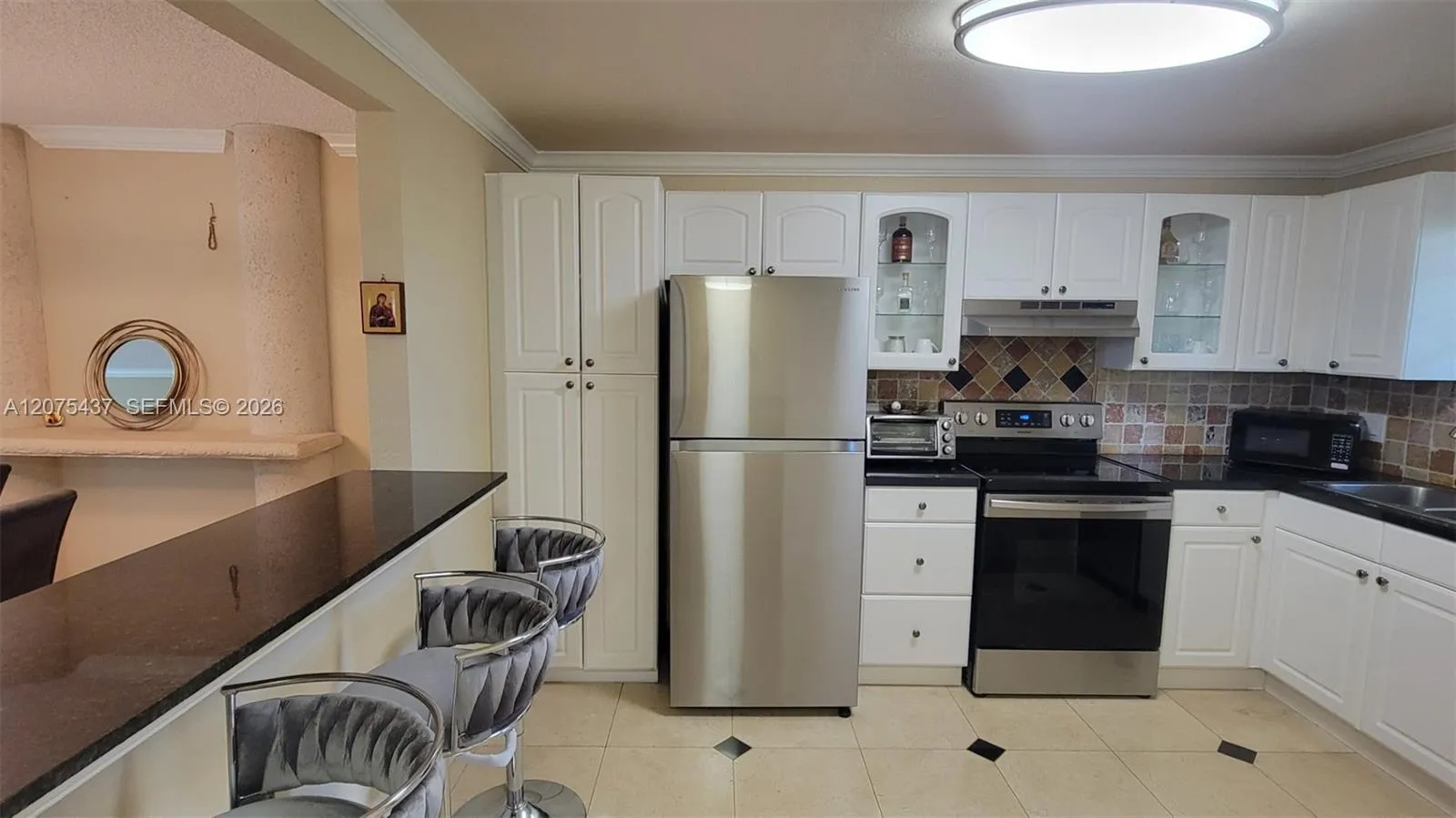 Foto de propiedad en 2410 Deer Creek Country Club Boulevard 310E, Deerfield Beach, FL 33442 Deerfield Beach con MLS# 