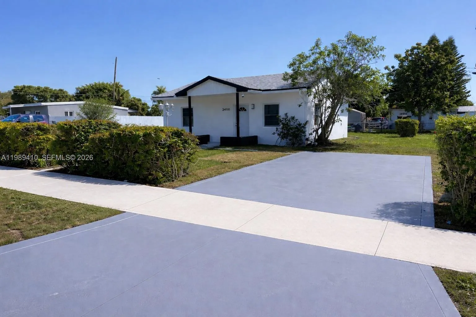 Foto de propiedad en 2450 NW 157th St Road, Miami Gardens, FL 33054 Miami Gardens con MLS# 