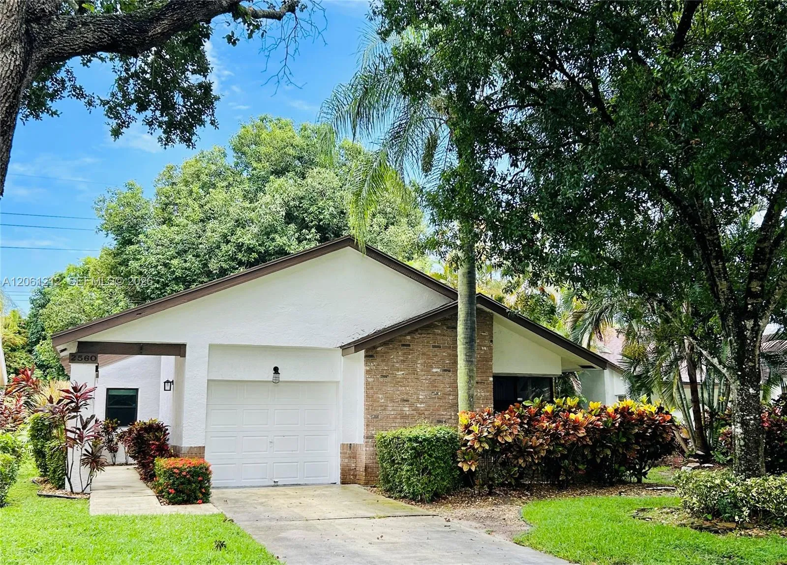 Foto de propiedad en 2560 Calamondin Circle, Coconut Creek, FL 33063 Coconut Creek con MLS# 