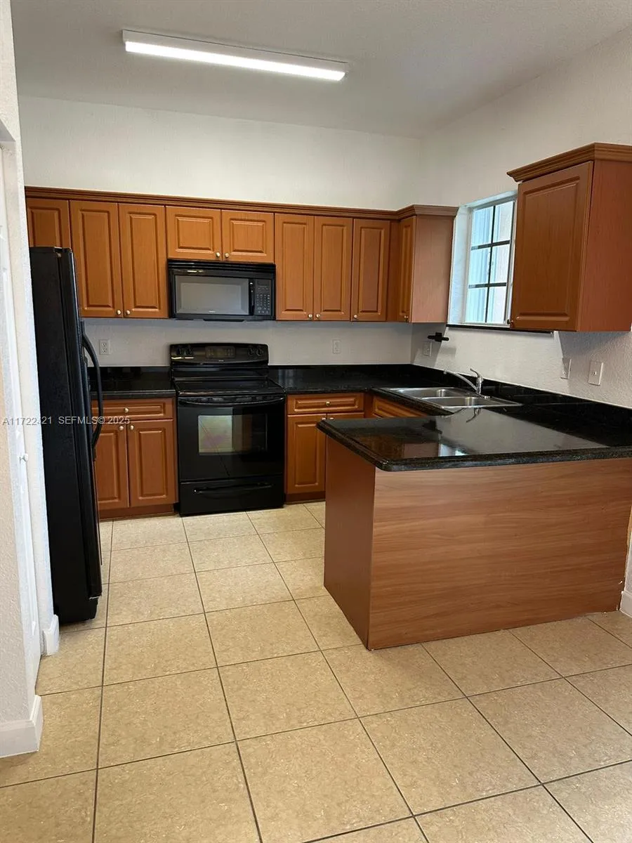 Foto de propiedad en 2589 NE 4th Street 205, Homestead, FL 33033 Homestead con MLS# 