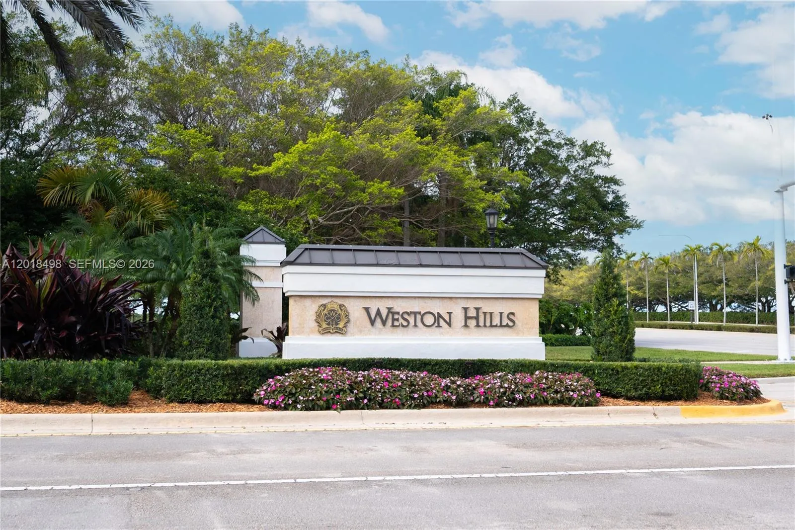 Foto de propiedad en 2621 Oakbrook Lane, Weston, FL 33332 Weston con MLS# 