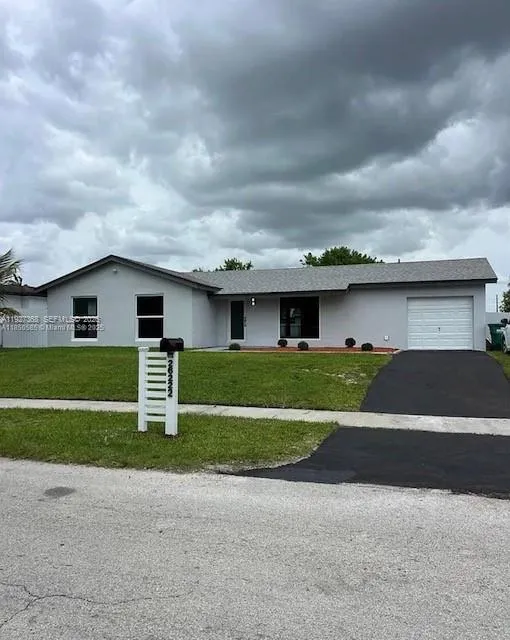 Foto de propiedad en 26222 SW 124th Place, Homestead, FL 33032 Homestead con MLS# 