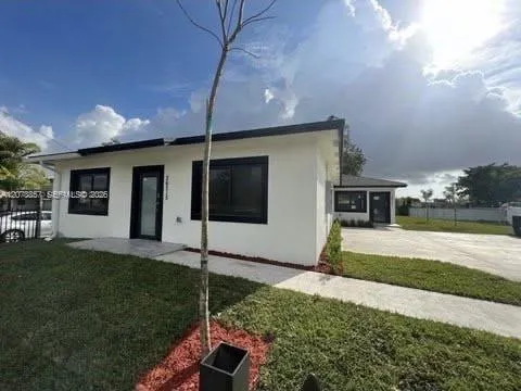 Foto de propiedad en 26515 SW 139th Avenue A, Homestead, FL 33032 Homestead con MLS# 