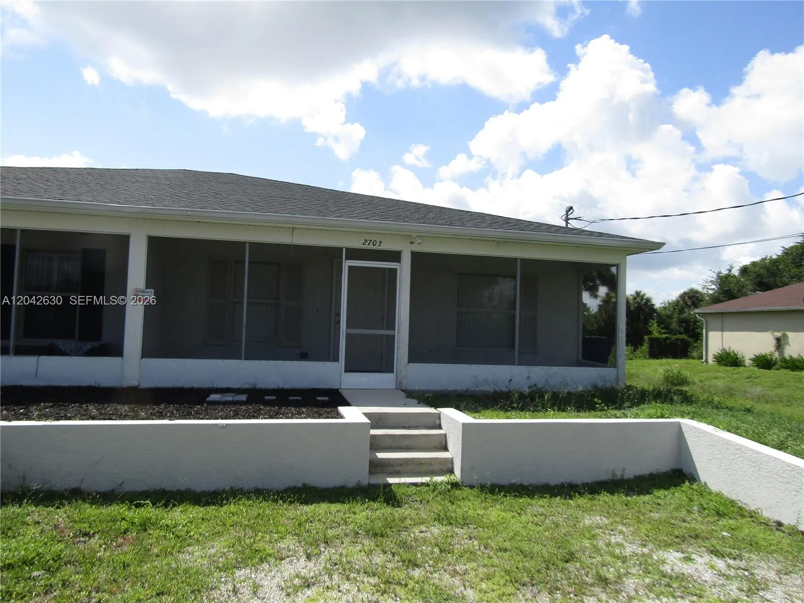 Foto de propiedad en 2703 S Ansel 2703, Lehigh Acres, FL 33973 Lehigh Acres con MLS# 