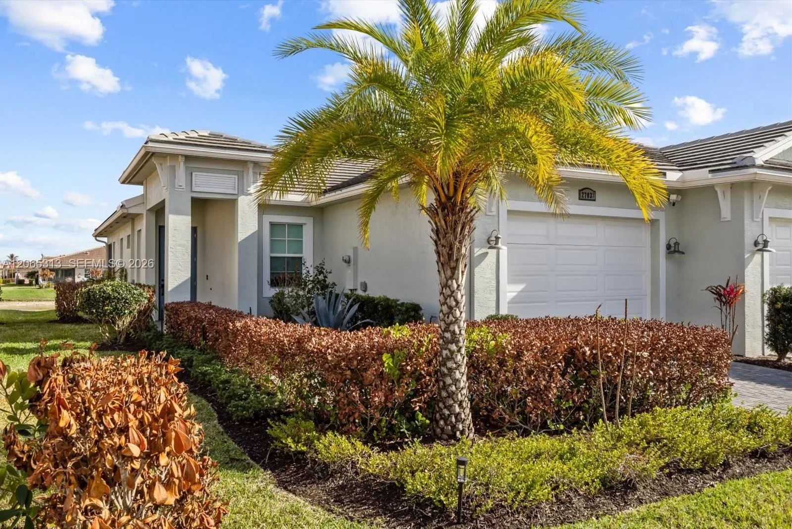 Foto de propiedad en 27033 SW Viterbo Way, Port St. Lucie, FL 34986 Port St. Lucie con MLS# 