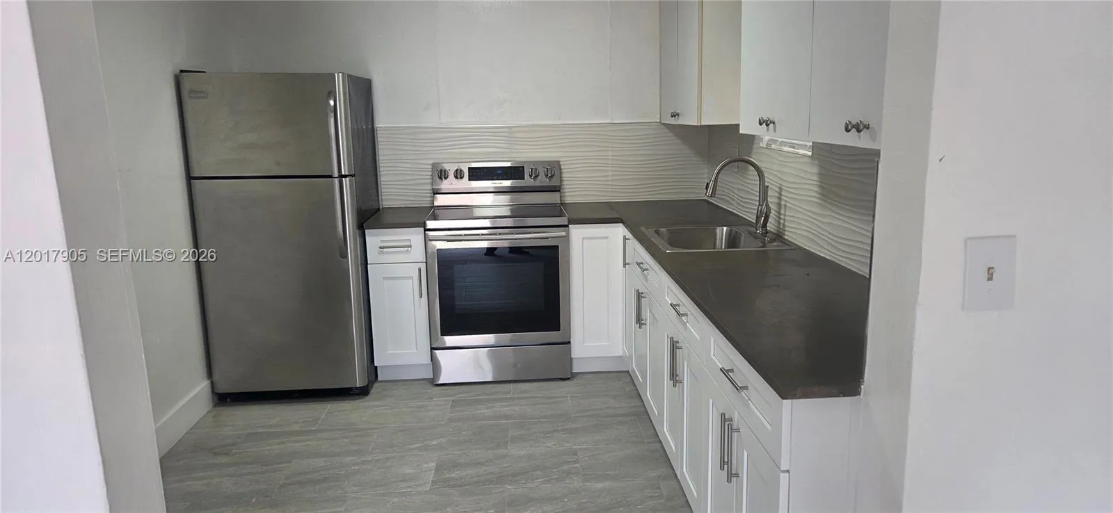 Foto de propiedad en 2761 NW 16th Terrace 2, Miami, FL 33125 Miami con MLS# 