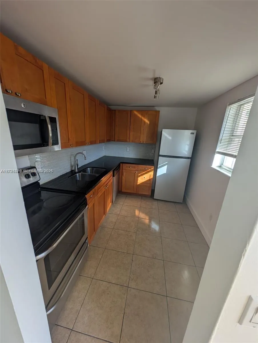 Foto de propiedad en 2800 NW 56th Avenue B202, Lauderhill, FL 33313 Lauderhill con MLS# 