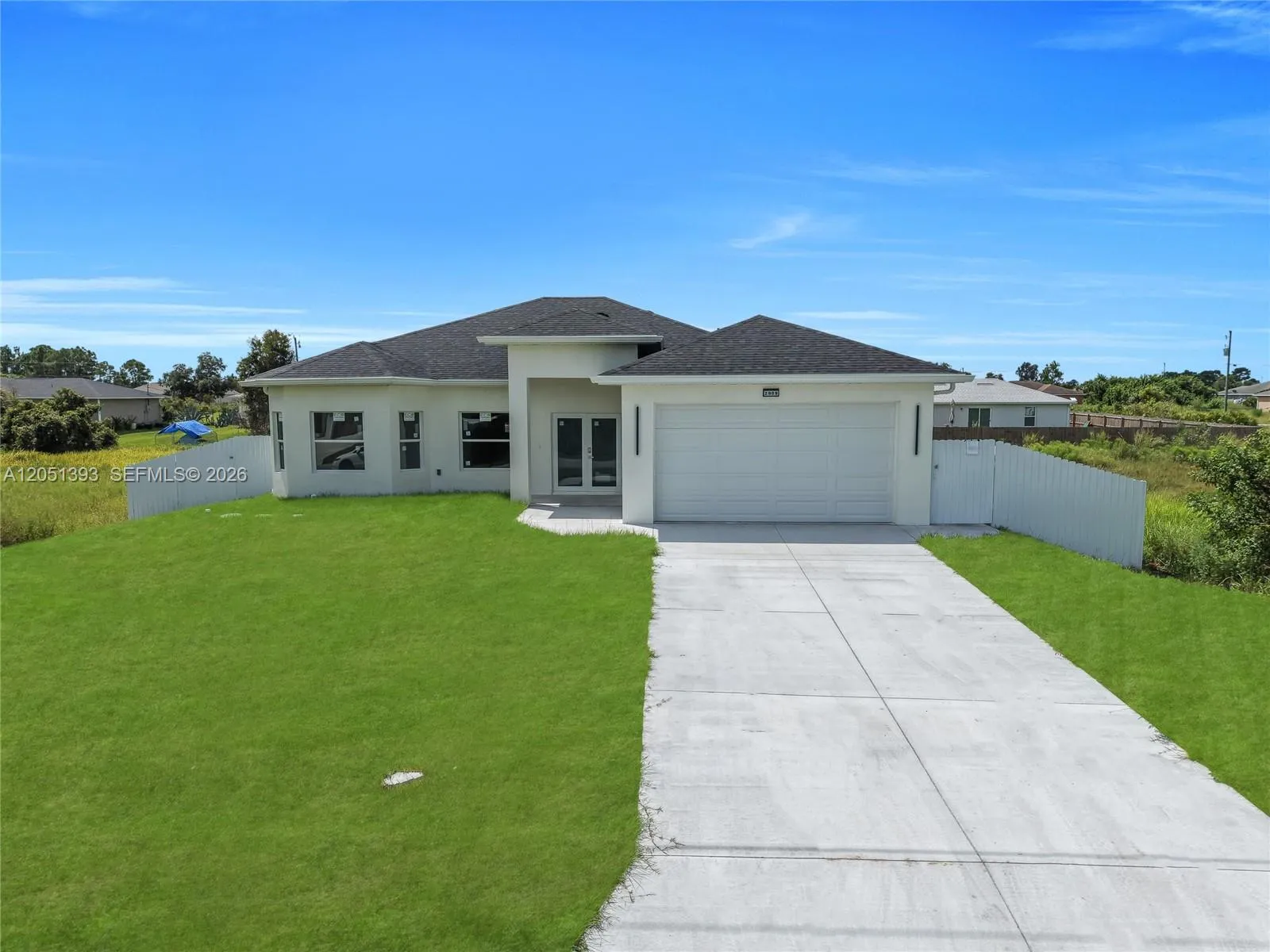 Foto de propiedad en 2909 63rd Street W, Lehigh Acres, FL 33971 Lehigh Acres con MLS# 