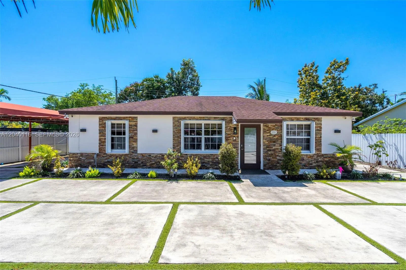 Foto de propiedad en 302 NW 100th Street, Miami, FL 33150 Miami con MLS# 