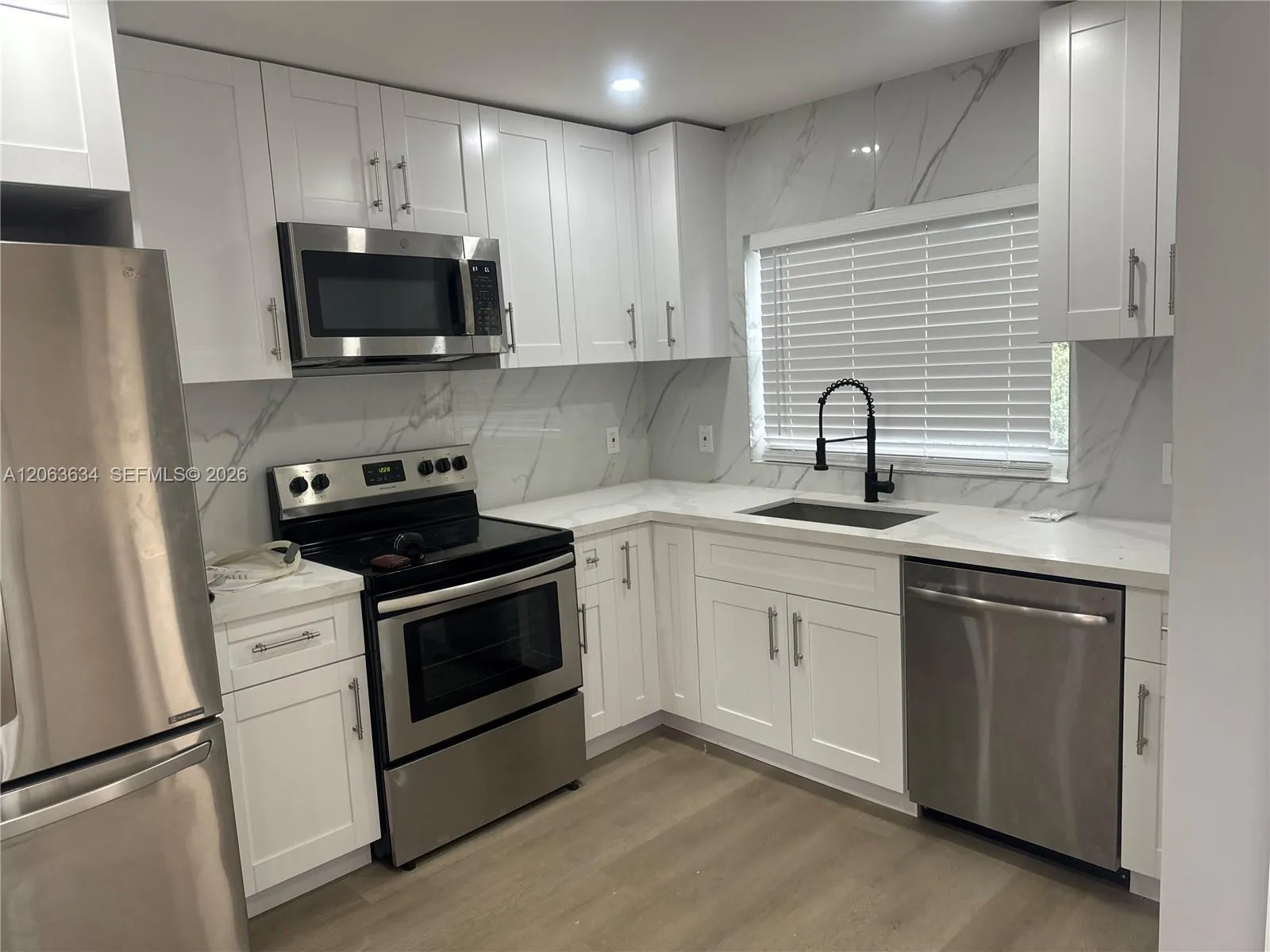 Foto de propiedad en 3020 NW 203rd Lane 3020, Miami Gardens, FL 33056 Miami Gardens con MLS# 