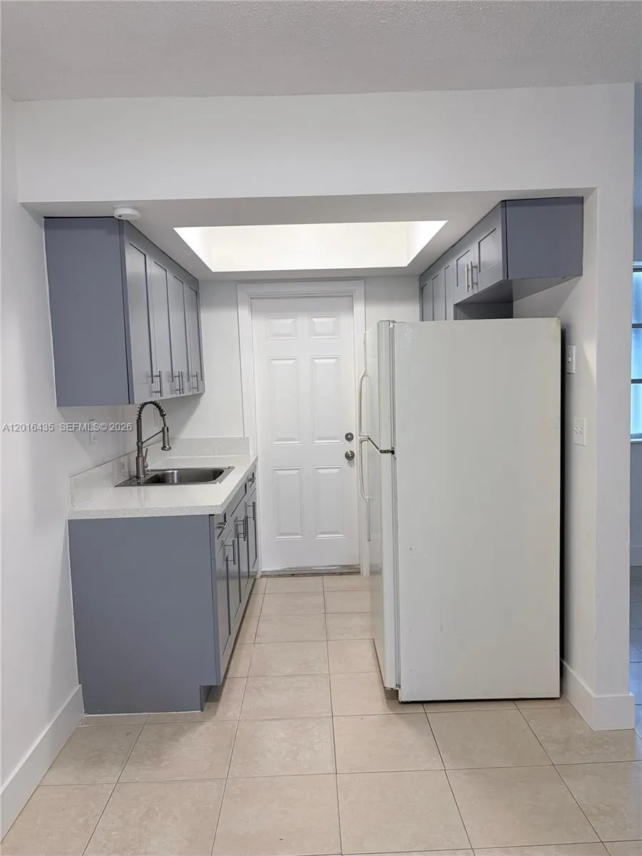 Foto de propiedad en 31 NW 163rd Street 65, Miami, FL 33169 Miami con MLS# 