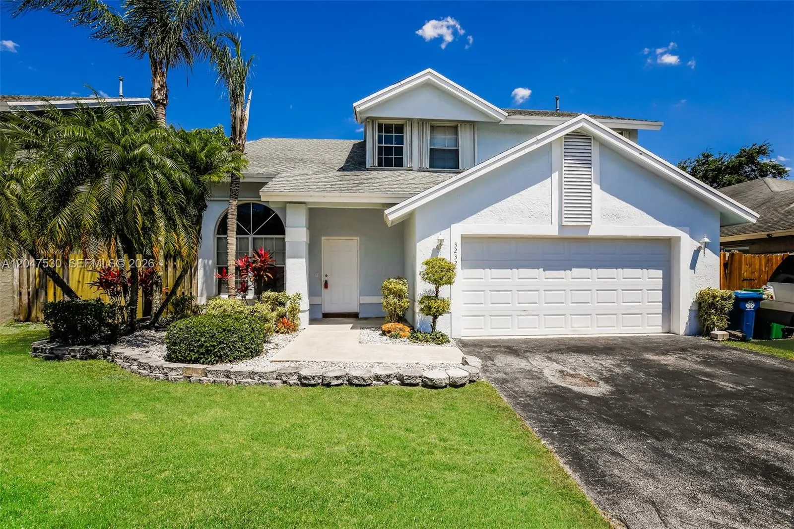 Foto de propiedad en 3232 NW 121st Avenue, Sunrise, FL 33323 Sunrise con MLS# 