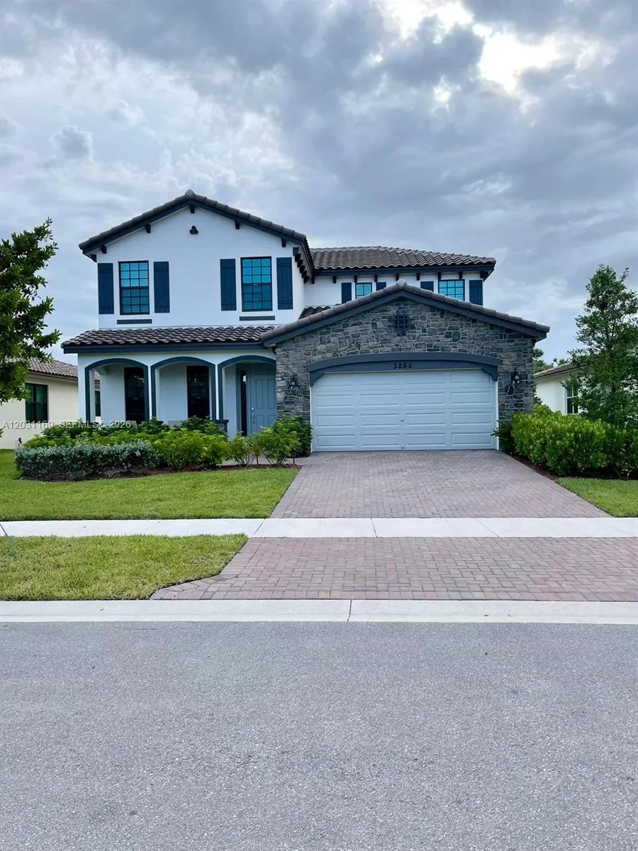 Foto de propiedad en 3265 Dunning Drive, Royal Palm Beach, FL 33411 Royal Palm Beach con MLS# 
