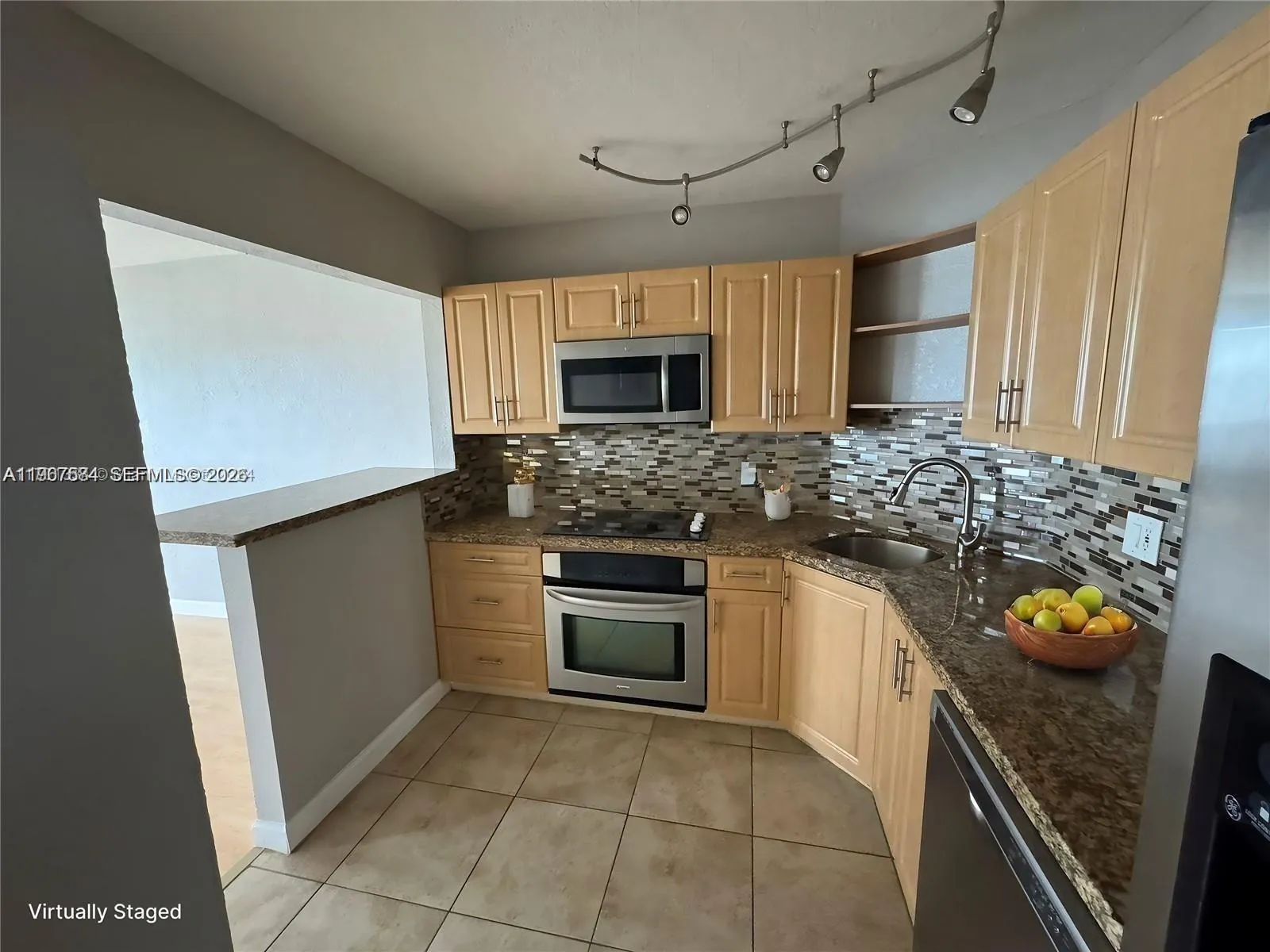 Foto de propiedad en 3301 Spanish Moss Terrace 604, Lauderhill, FL 33319 Lauderhill con MLS# 