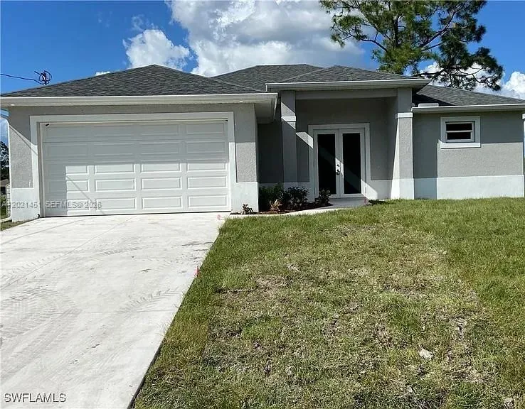 Foto de propiedad en 3304 11 Street W, Lehigh Acres, FL 33971 Lehigh Acres con MLS# 