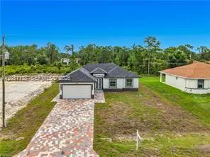 Foto de propiedad en 3310 61st Street, Lehigh Acres, FL 33971 Lehigh Acres con MLS# 