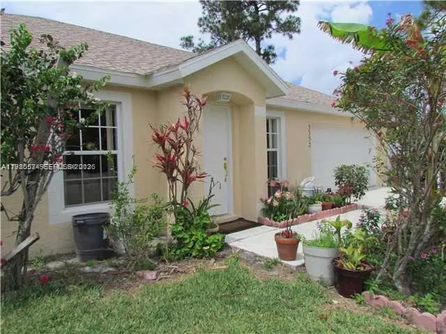 Foto de propiedad en 3352 SW Himango Street, Port St. Lucie, FL 34953 Port St. Lucie con MLS# 