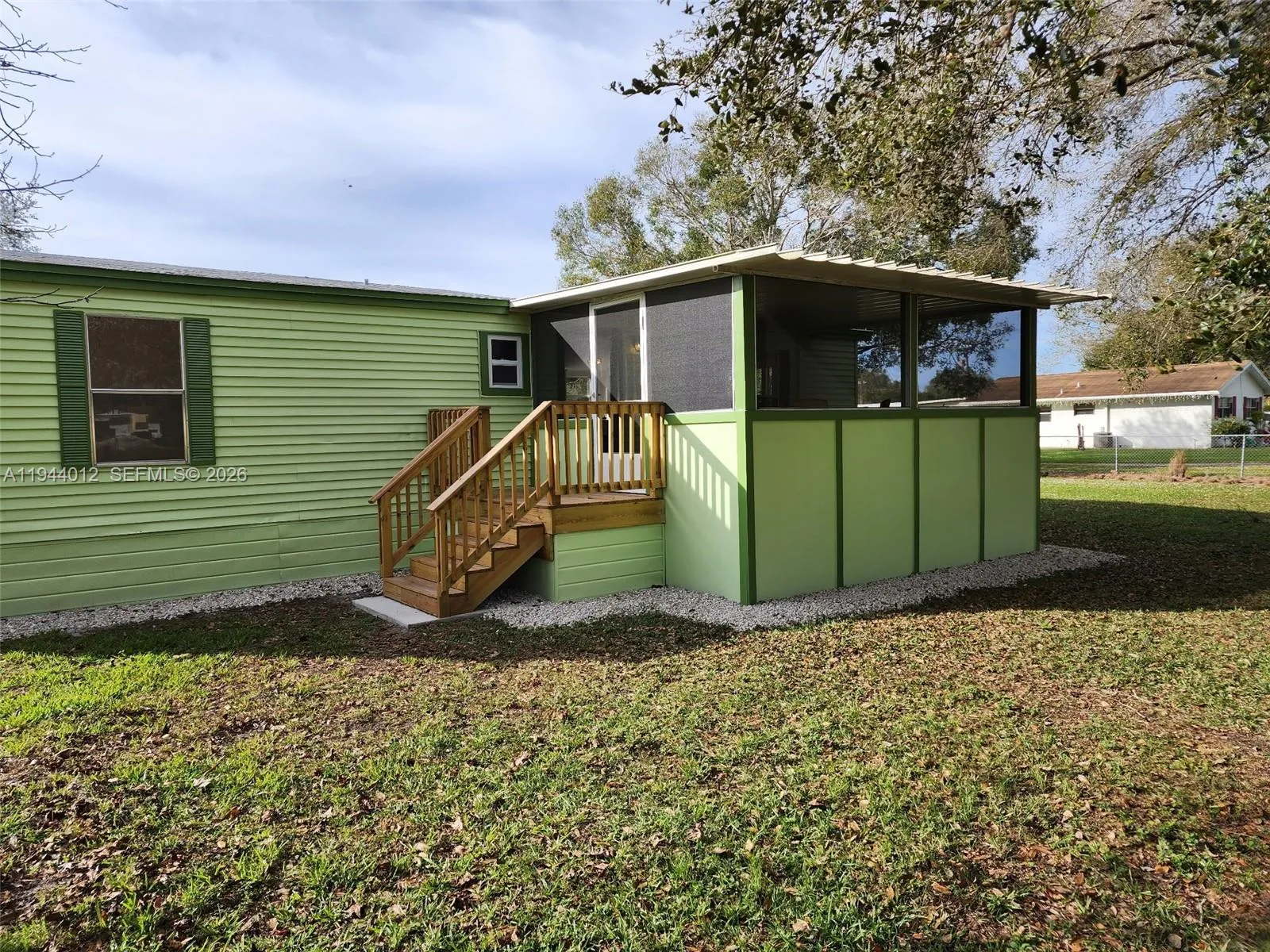 Foto de propiedad en 3565 NW 10th Avenue, Okeechobee, FL 34972 Okeechobee con MLS# 