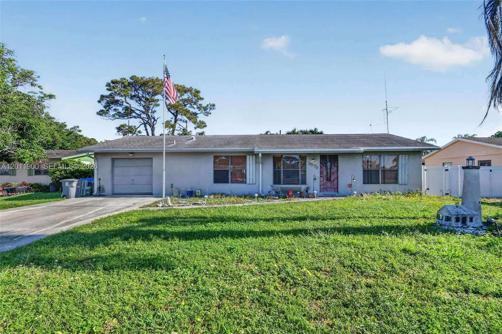 A canal facing home with no HOA & 1 car garage.