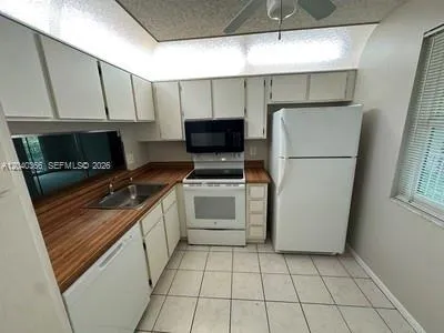 Foto de propiedad en 3578 N University Drive I-5, Coral Springs, FL 33065 Coral Springs con MLS# 