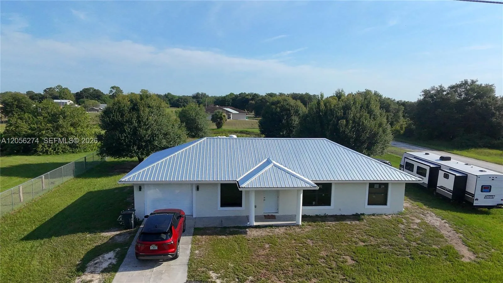 Foto de propiedad en 369 Horse Club Avenue, FL 33440  con MLS# 