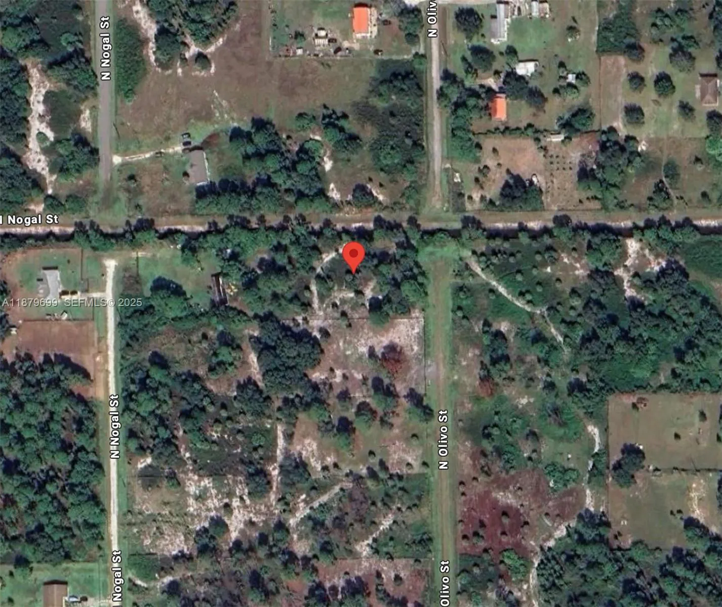 Foto de propiedad en 380 N Olivo Street, Clewiston, FL 33440 Clewiston con MLS# 
