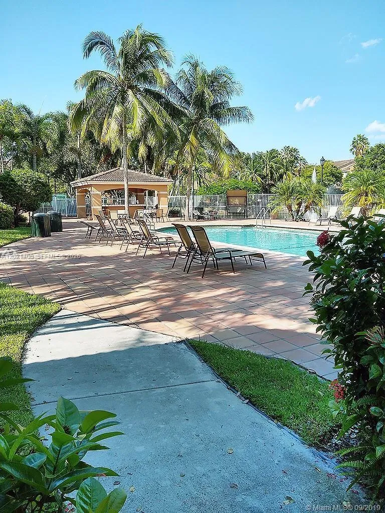Foto de propiedad en 3870 Lyons Road 209-8, Coconut Creek, FL 33073 Coconut Creek con MLS# 