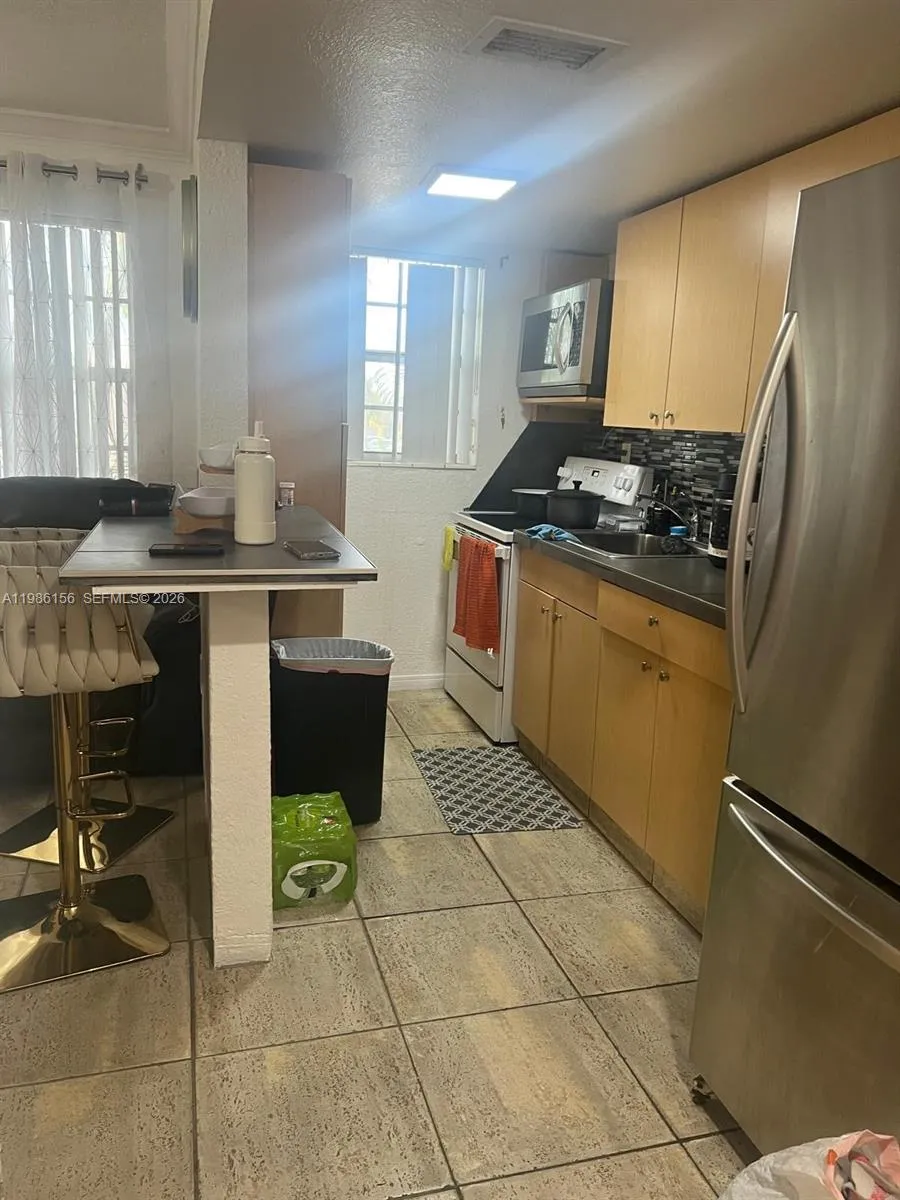 Foto de propiedad en 3901 SW 112th Avenue 34, Miami, FL 33165 Miami con MLS# 