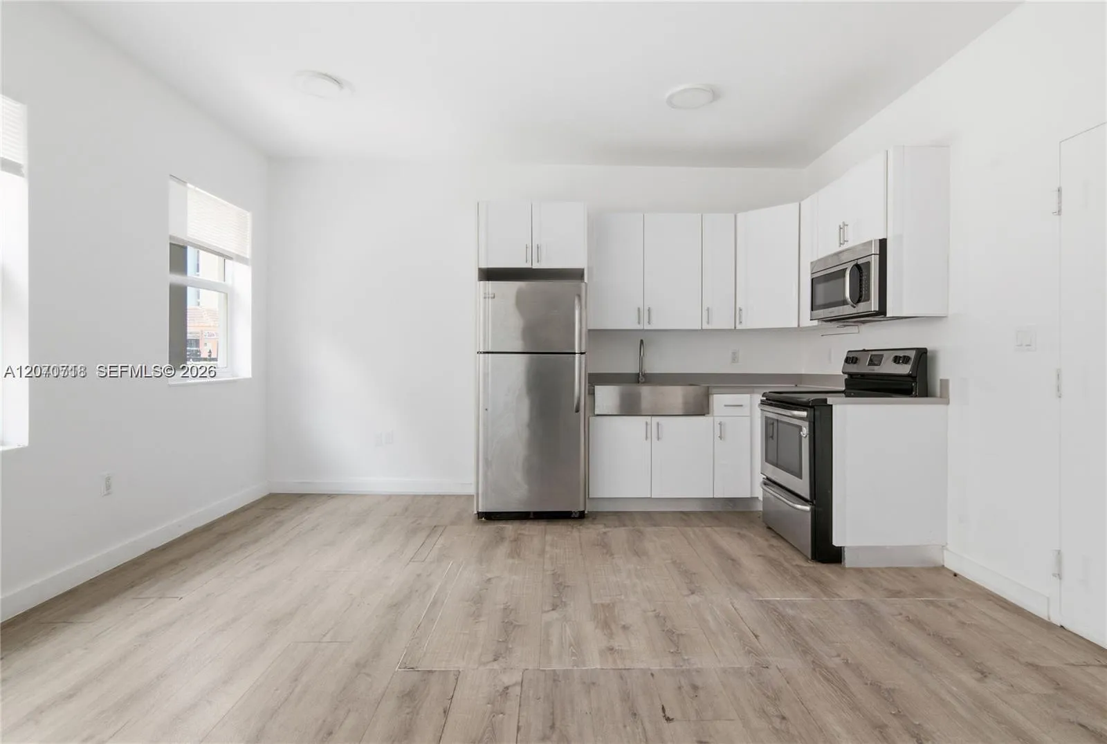 Foto de propiedad en 402 NW 12th Avenue 207, Miami, FL 33128 Miami con MLS# 