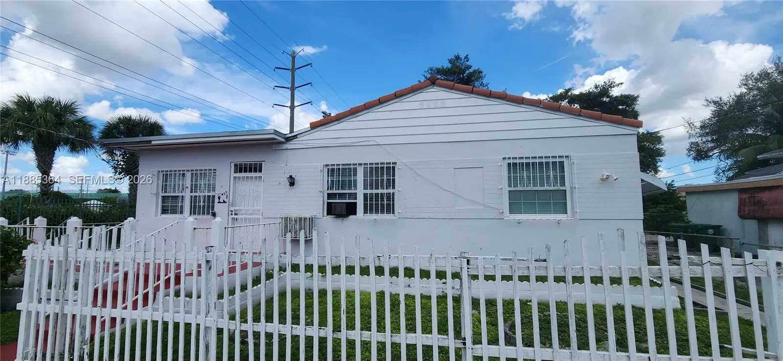 Foto de propiedad en 405 NW 64th Street, Miami, FL 33150 Miami con MLS# 