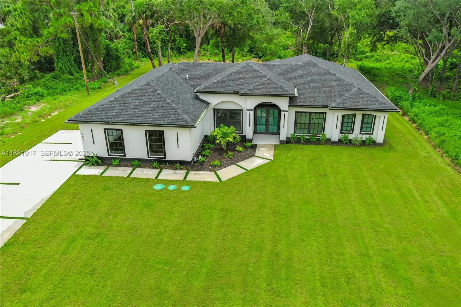 Foto de propiedad en 407 Washington Avenue, Lehigh Acres, FL 33972 Lehigh Acres con MLS# 
