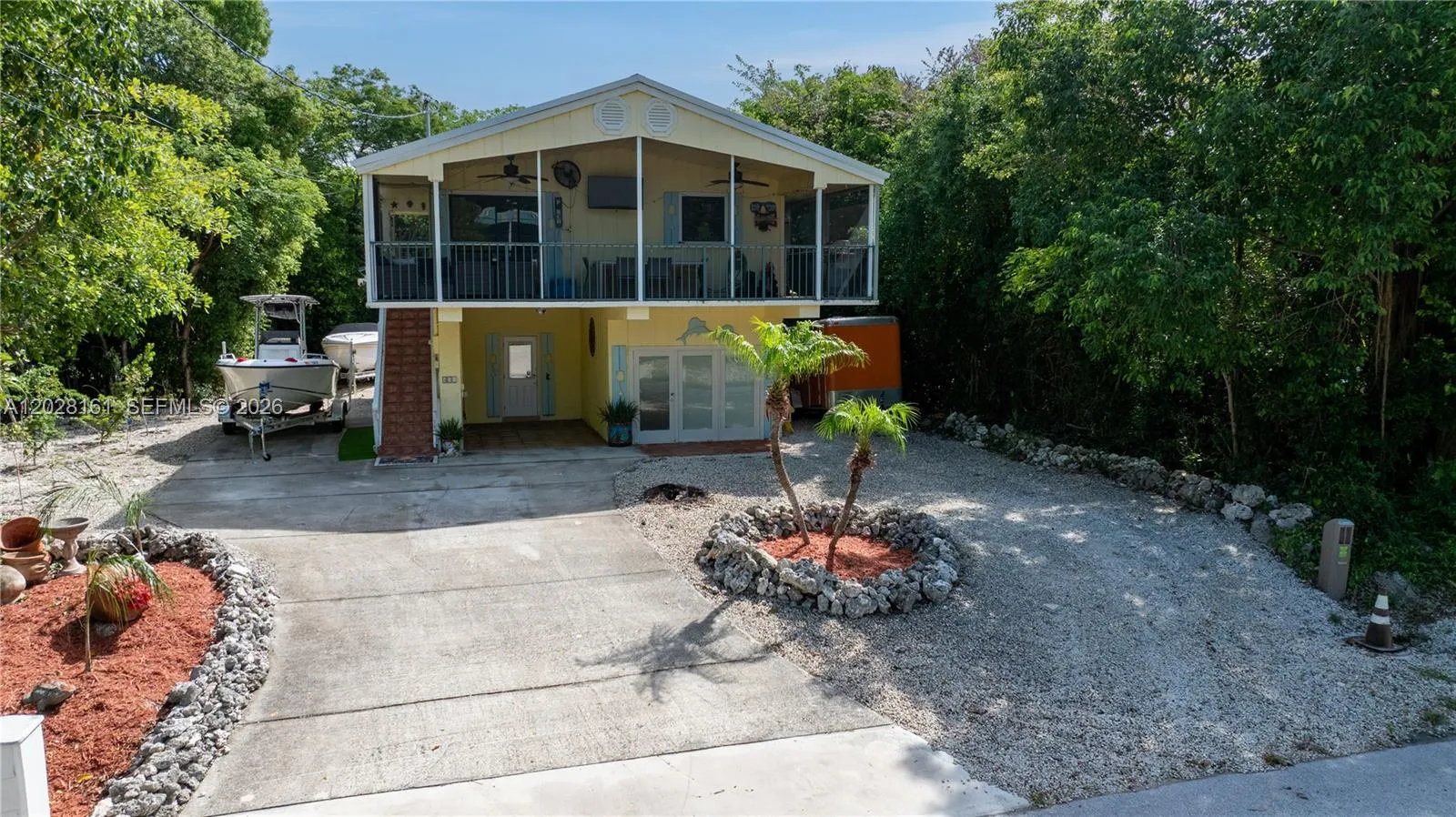 Foto de propiedad en 411 Mahogany Avenue, Key Largo, FL 33037 Key Largo con MLS# 
