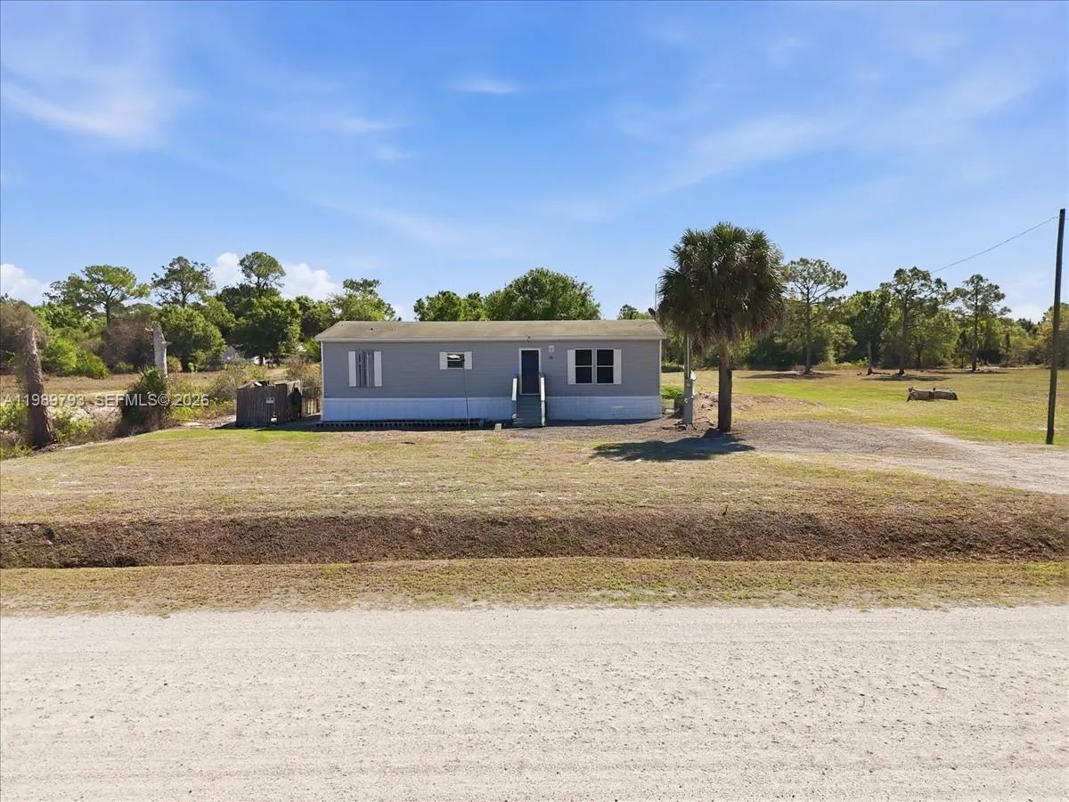 Foto de propiedad en 415 S Kennel Street, Clewiston, FL 33440 Clewiston con MLS# 