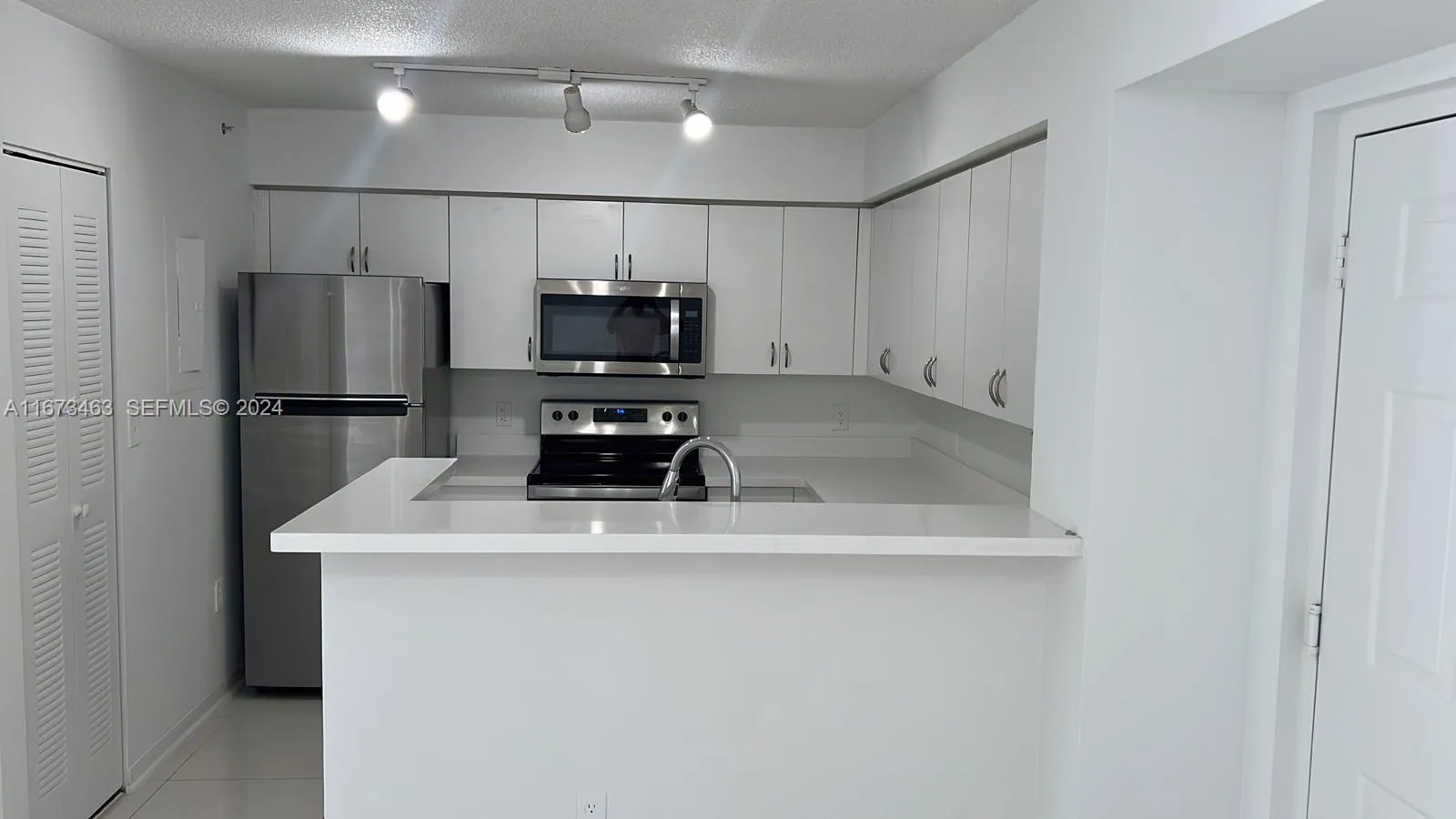 Foto de propiedad en 4350 NW 107th Avenue 201-2, Doral, FL 33178 Doral con MLS# 