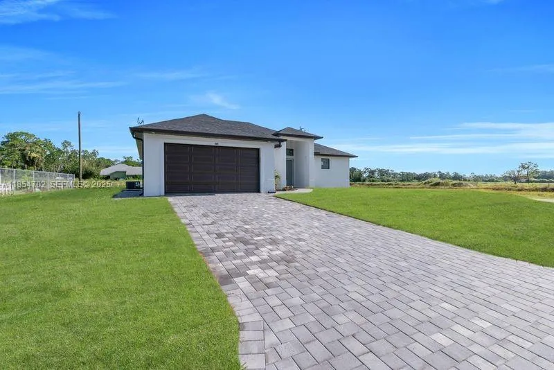Foto de propiedad en 4507 E 9th Street, Lehigh Acres, FL 33972 Lehigh Acres con MLS# 
