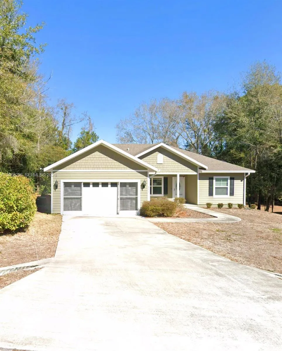 Foto de propiedad en 451 NE 151 Terrace, FL 32696  con MLS# 