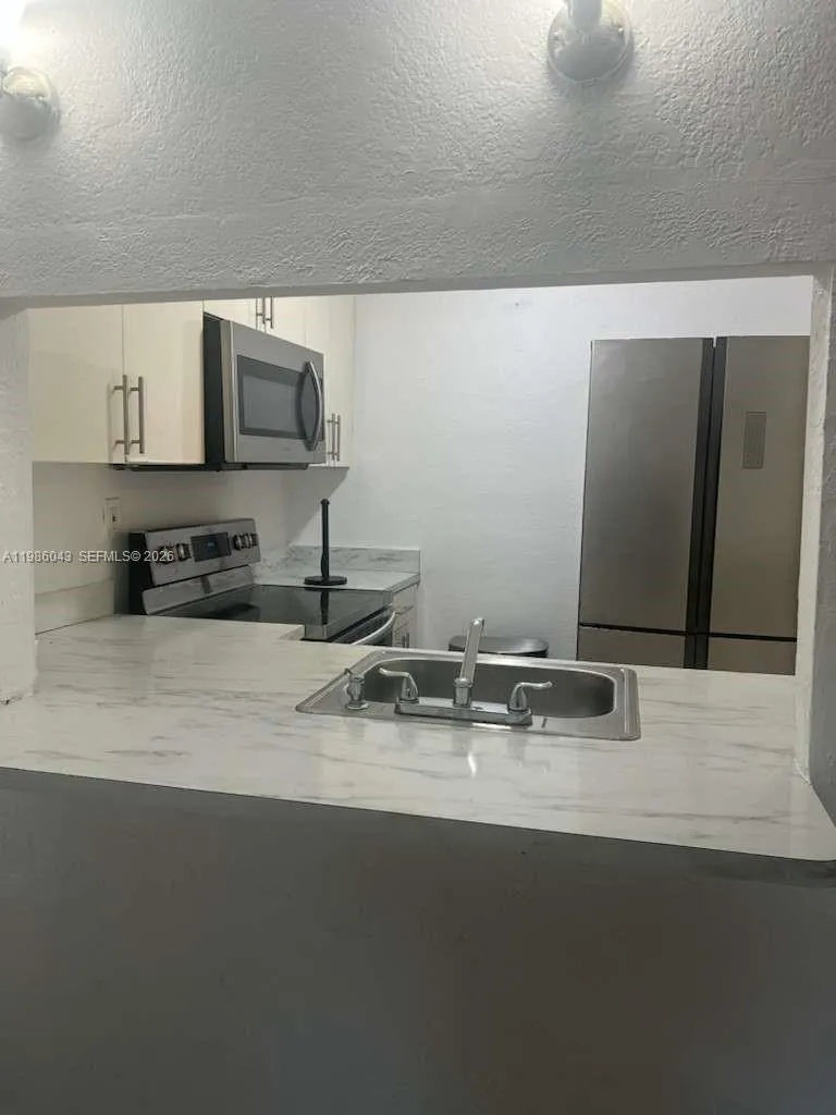 En Venta 4550 NW 9th Street 114E, Miami, FL 33126, Miami, FL 33126