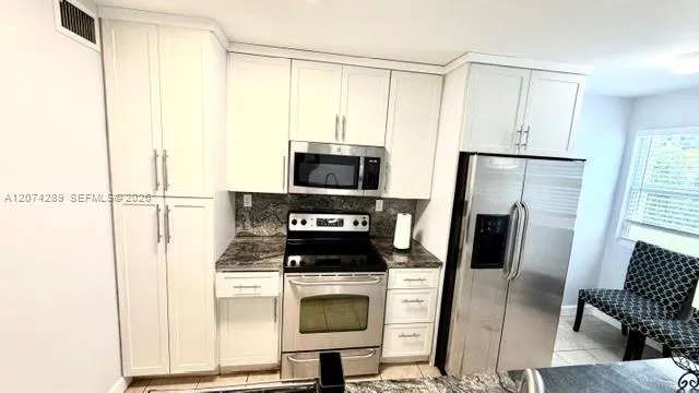 Foto de propiedad en 4609 NW 97th Court 1, Doral, FL 33178 Doral con MLS# 