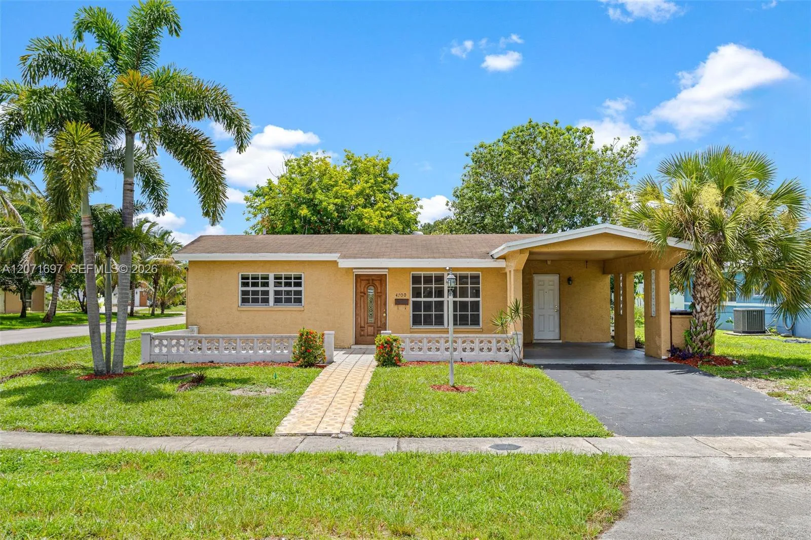 Foto de propiedad en 4700 NW 41st Place, Lauderdale Lakes, FL 33319 Lauderdale Lakes con MLS# 