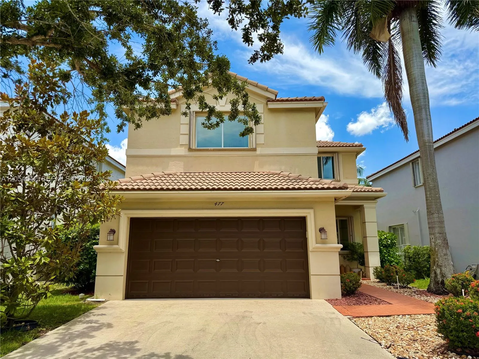 Foto de propiedad en 477 Fishtail Terrace, Weston, FL 33327 Weston con MLS# 
