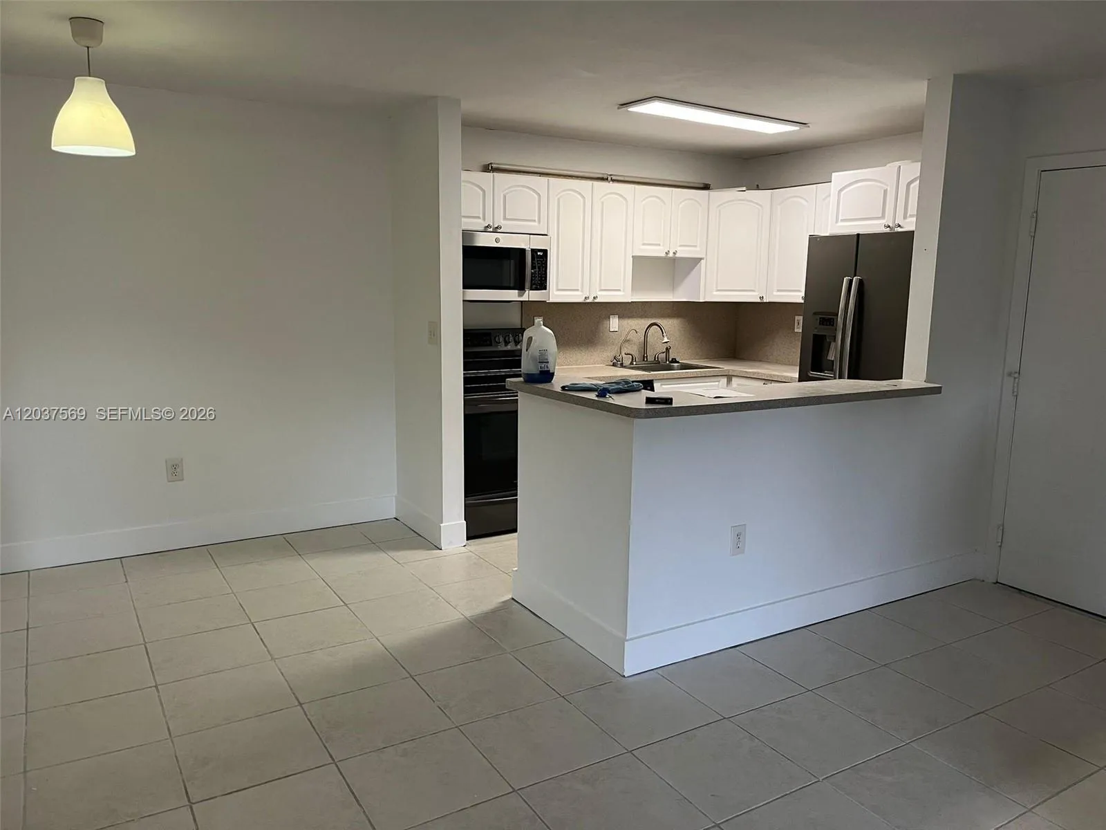 Foto de propiedad en 4800 NW 102nd Avenue 103-10, Doral, FL 33178 Doral con MLS# 