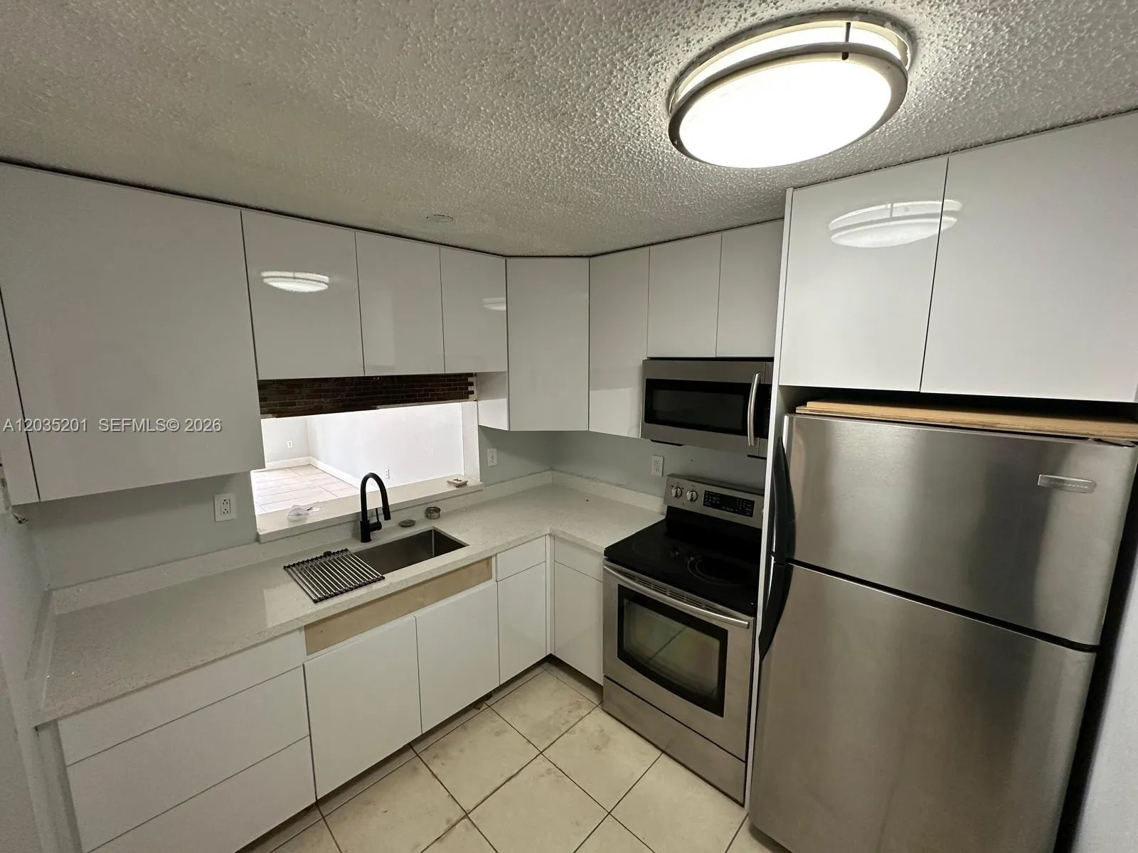 Foto de propiedad en 484 NW 165th St Road A-109, Miami, FL 33169 Miami con MLS#