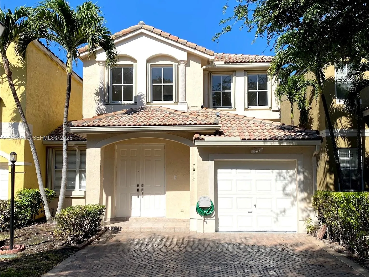 Foto de propiedad en 4874 NW 107th Path -, Doral, FL 33178 Doral con MLS# 