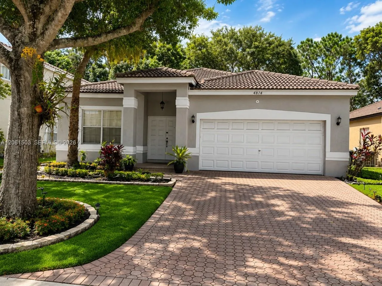 Foto de propiedad en 4874 NW 57th Manor, Coconut Creek, FL 33073 Coconut Creek con MLS# 