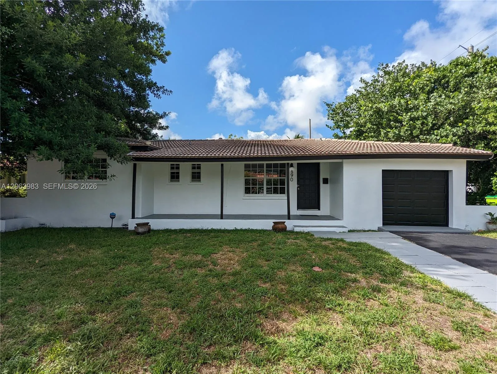Foto de propiedad en 490 NW 90th Street ., El Portal, FL 33150 El Portal con MLS# 