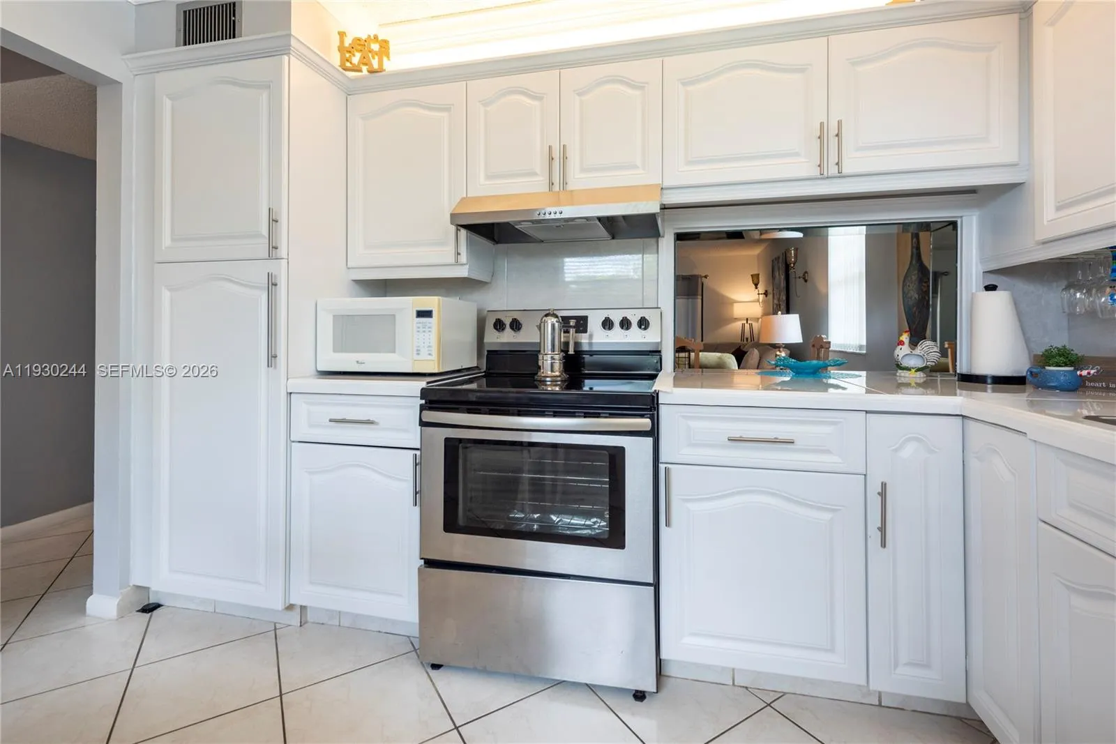 Foto de propiedad en 4940 E Sabal Palm Boulevard 414, Tamarac, FL 33319 Tamarac con MLS# 