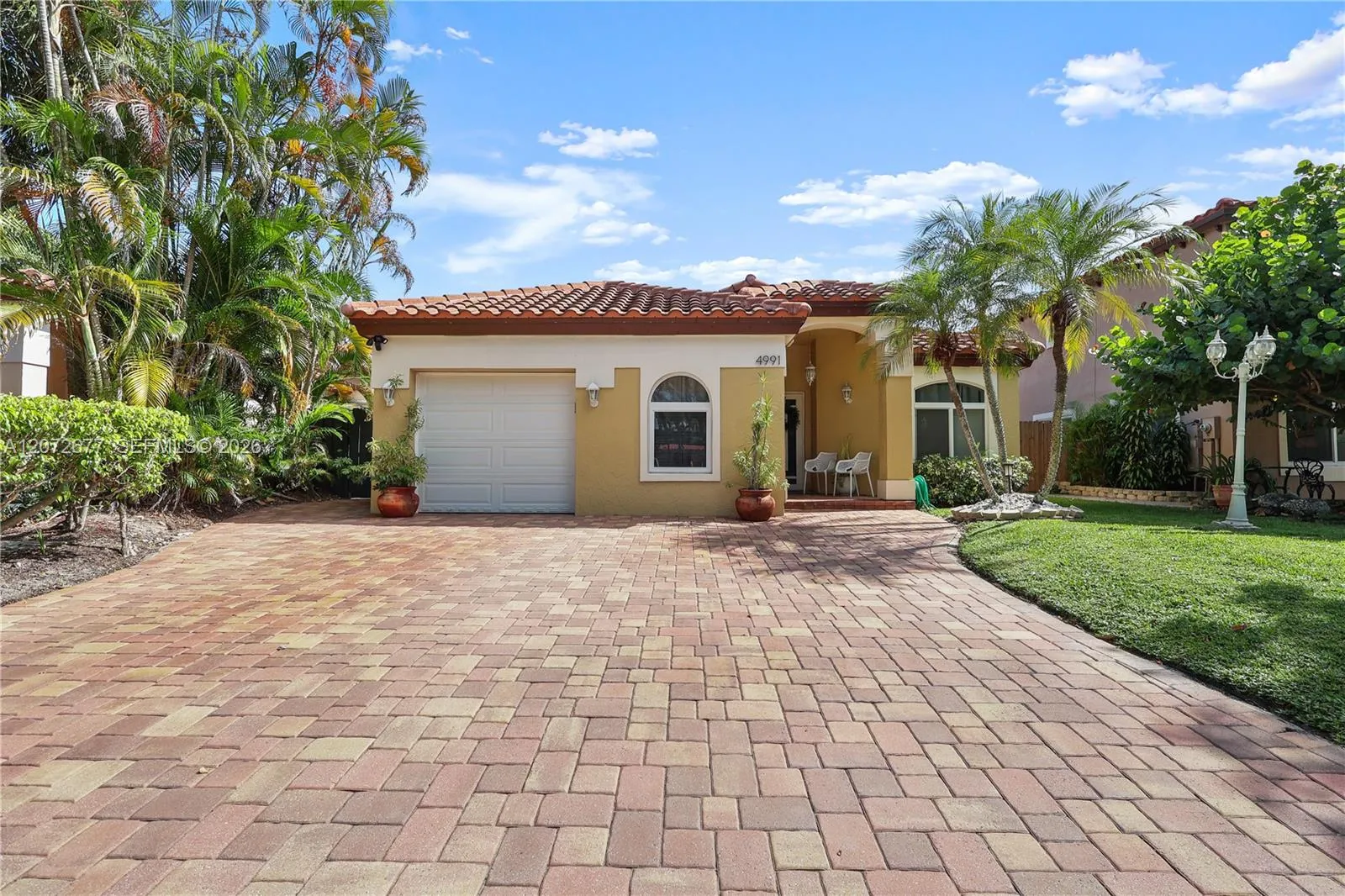 Foto de propiedad en 4991 NW 54th Street, Coconut Creek, FL 33073 Coconut Creek con MLS# 