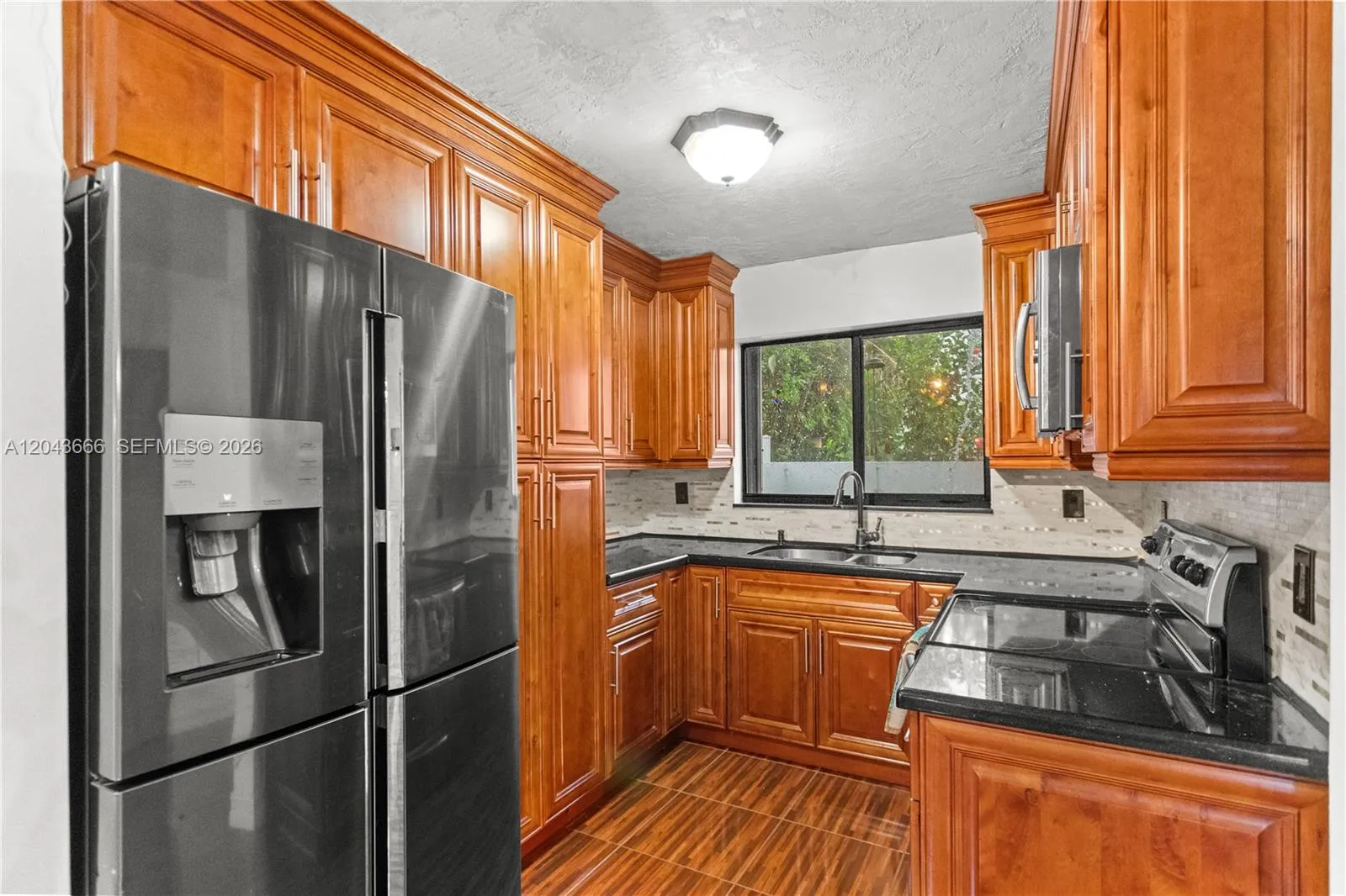 Foto de propiedad en 5065 NW 195th Lane, Miami Gardens, FL 33055 Miami Gardens con MLS# 